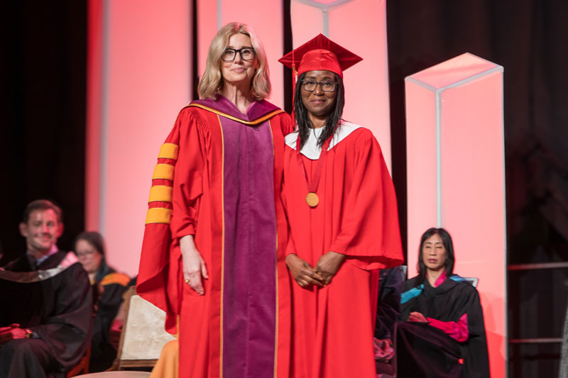 Carolyn Campbell standing next to Kemi Bankole the President’s medal winner