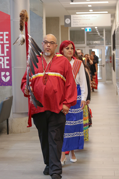 Students walking into the atrium