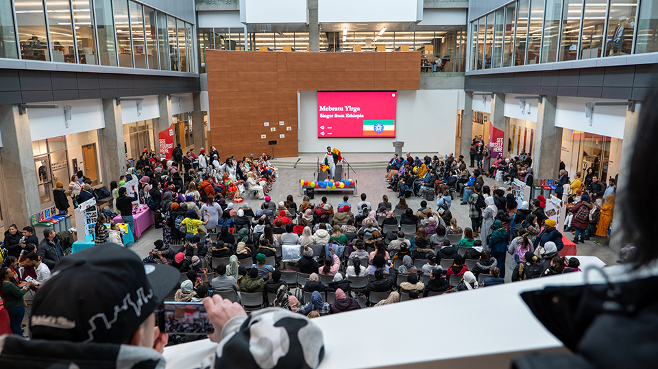 A wide shot of Atrium with a large group of people attending LINCFest